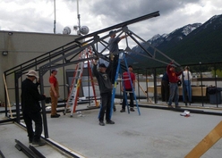 Securing the second truss to the first around 11am.